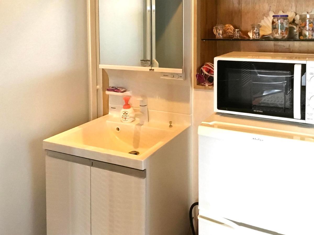 Hotel Minshuku Yadokari à Zamami Extérieur photo
